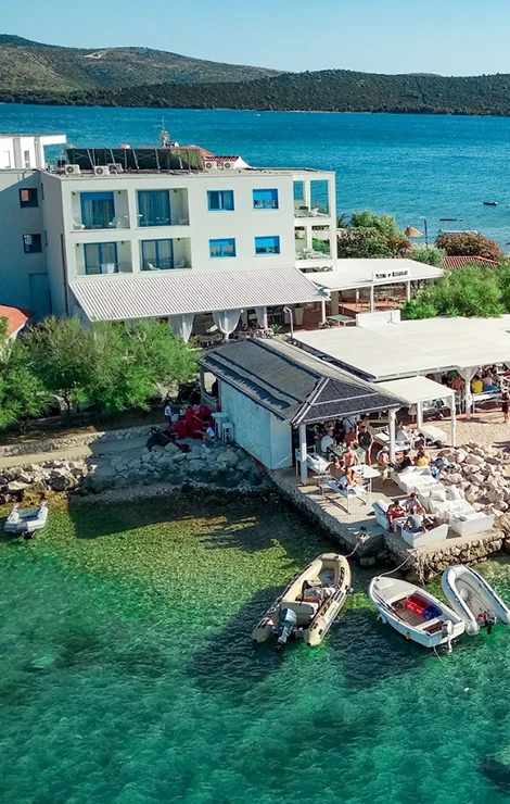 Private accommodation steps from the beach club experience.